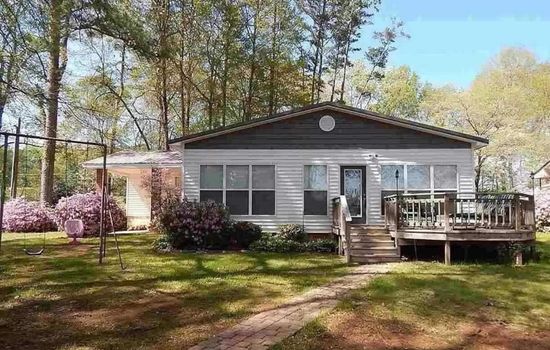 Lakefront home- 3 slip boathouse-Large yard