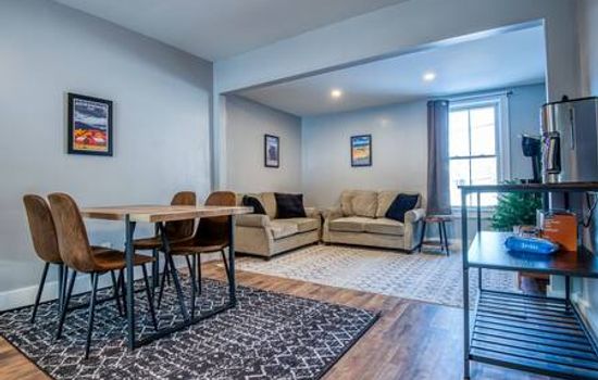 Relax at the end of the day on two comfortable love seats and use the 46" smart TV.