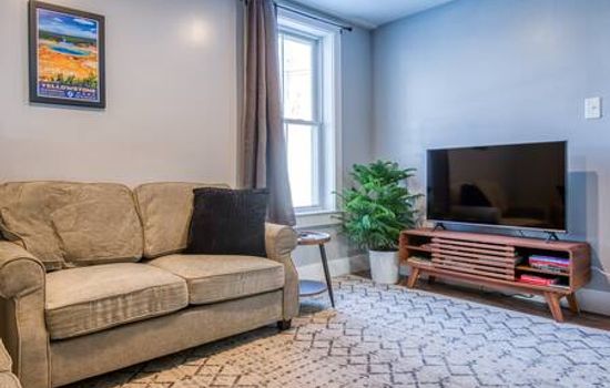 Relax at the end of the day on two comfortable love seats and use the 46" smart TV.