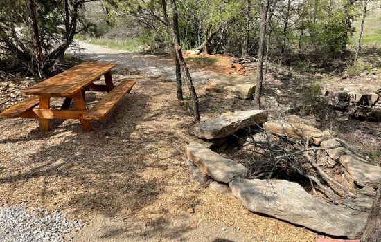 Serenity Campsite Lake Godstone Large picnic table and fire pit