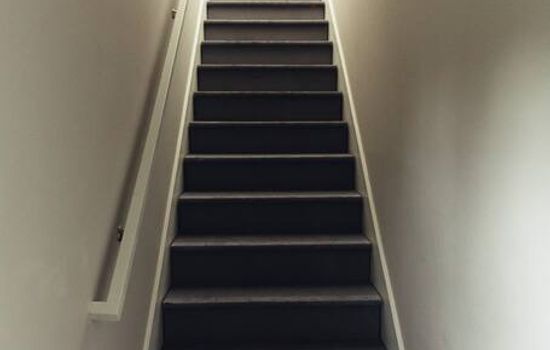 Stairs to private apartment over detached garage