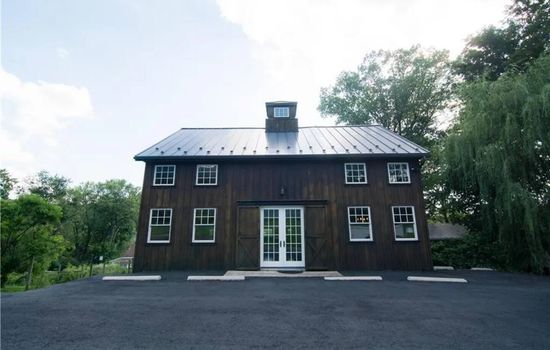 Pull right up with plenty of parking to the beautiful barn home.