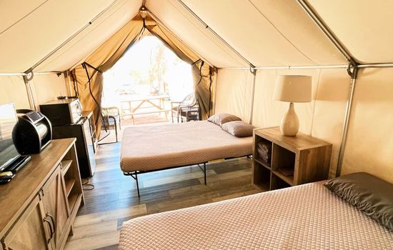 Come with 2 queen beds w/ sheets and pillows.