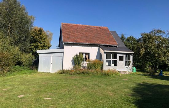 auf einem Gutshof mit eigenem Garten in ländlicher Umgebung