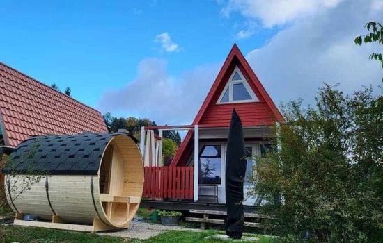 Haus am See mit Fasssauna, Liegewiese und Grill