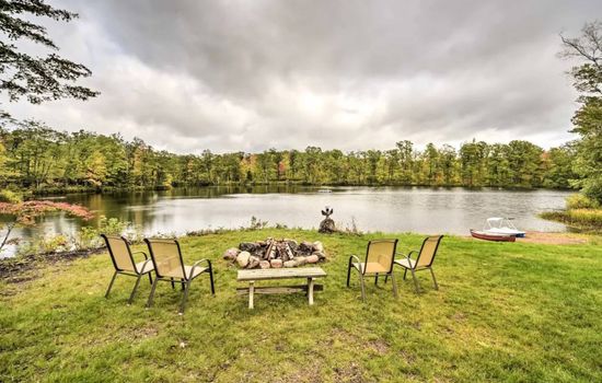 Backyard view of Big Tower Lake, Little Tower Lake is to the right of Big Tower Lake. Lots of pan fish in Big Tower Lake.  Also enjoy the family of otters that love to visit.  Canoe, 2 Kayaks and Pedalboat on site for your use. Dock too