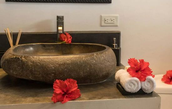 Beautiful granite sink in the private bathroom.  