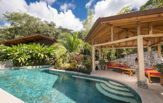 Massive pool overlooking the river and gardens