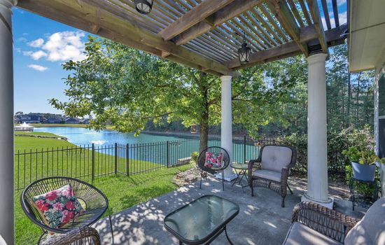 A unique and peaceful oasis, our home is nestled on a private lake, stocked with fish. The lovely porch is shaded by an evergreen tree. During the spring, enjoy the lovely fragrance of the blooming jasmine bush and watch neighborhood ducks and geese