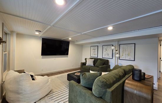 - Relax in this cozy living room with plush seating   - Enjoy the big-screen TV and bright inviting layout   - Perfect lounge spot for movie nights and group fun