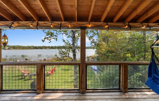 Screened in porch to enjoy water views and sip your morning coffee