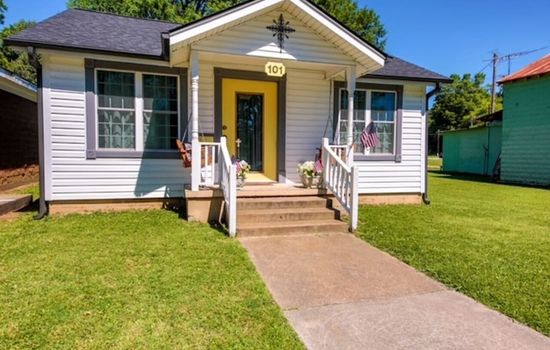 Enough room in the surrounding yard to throw a football, to kick a soccer ball, or to throw a baseball for a game of catch.