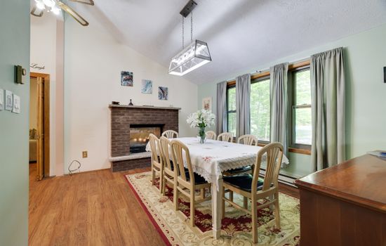 Dining room with seats for 8 and fireplace