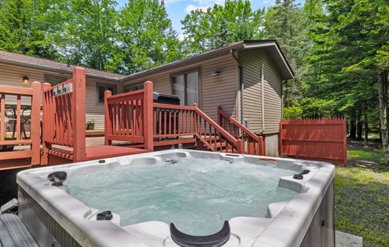 Backyard spa vibes—hot tub ready for relaxation any time of day