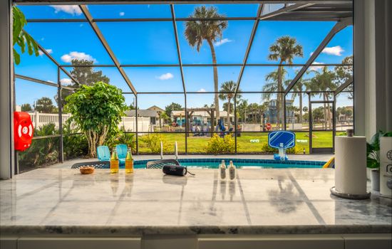 Heated saltwater pool with panoramic waterfront views — sunrise swims and sunset lounging.