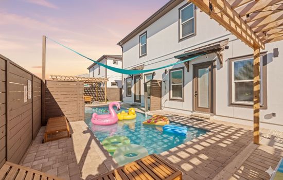 This is a large pool that runs the length of the building. As pictured, there's a divide that can be pulled across to close the pool so each side has their own privacy. It's about 40ft long and about 20ft on each side when the divider is up.