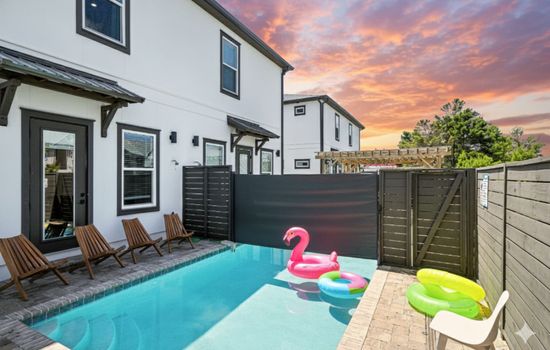 Enjoy privacy with this heated pool, with a retractable cover that comes across the pool.