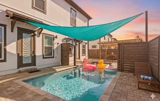 This is a large pool that runs the length of the building. As pictured, there's a divide that can be pulled across to close the pool so each side has their own privacy. It's about 40ft long and about 20ft on each side when the divider is up.