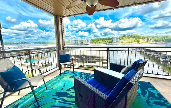 Maximize your lake experience with this spacious, covered deck — ideal for morning coffee or sunset cocktails.