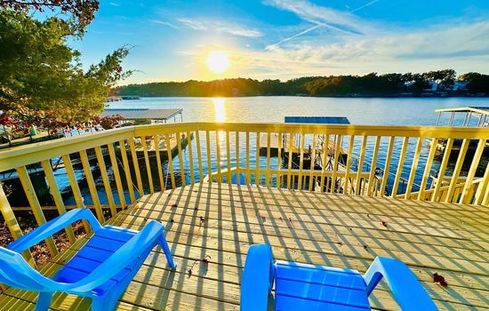 Embrace the beauty of nature with direct access to the shimmering lake.