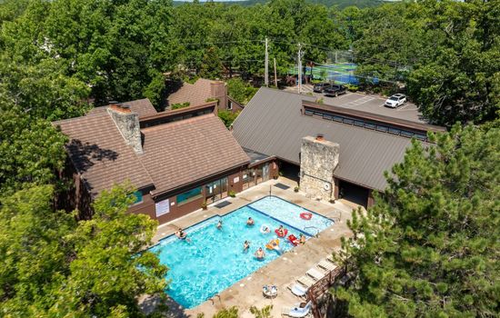 Dive into fun at The Knolls' outdoor pool! Perfect for cooling off during your Lake of the Ozarks getaway at Knoll Worries.