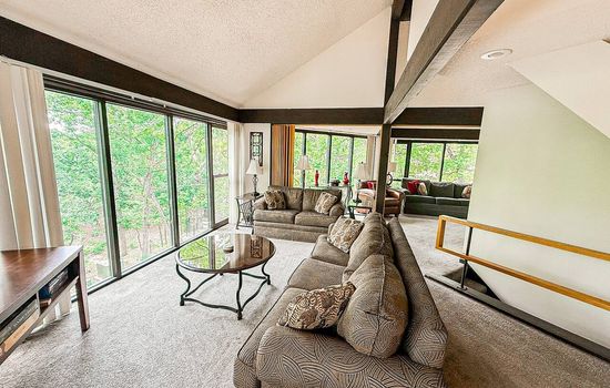 Bright, comfortable, and welcoming—Unit 57’s living room is your home base in the Ozarks.