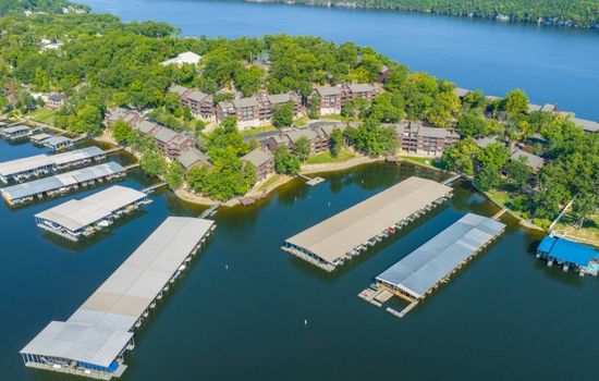 Welcome to The Knolls! See the extensive docks and prime lake access that await your stay at Knoll Worries, our luxury 2-bedroom condo. Enjoy seamless boating, fishing, and all the incredible community amenities this exclusive Lake of the Ozarks reso