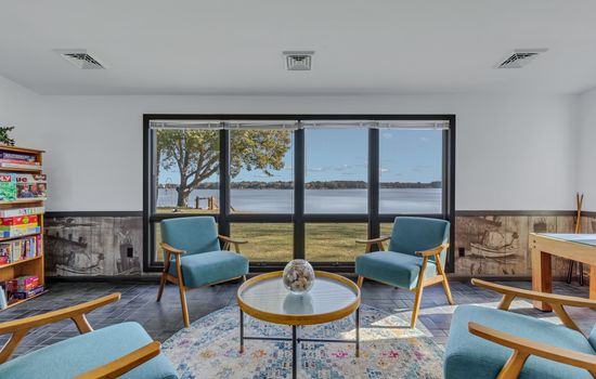 Leave the TVs behind to reconnect with loved ones in the sunroom - or just enjoy the view!