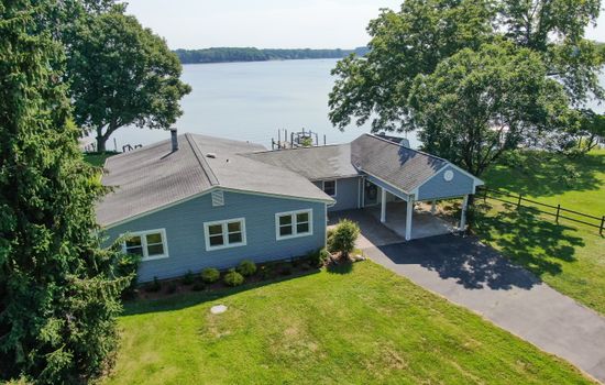 Gorgeous wide-open water views and single floor living where you can breathe out in the country.