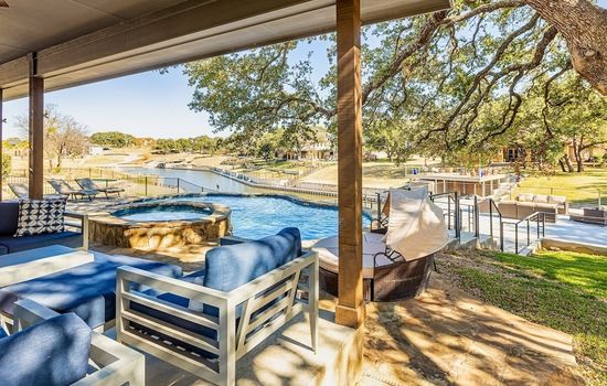 Covered patio, pool and upper deck 