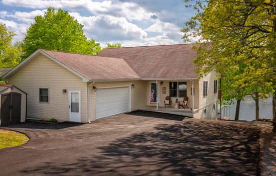 Asphalt drive and room for a boat trailer