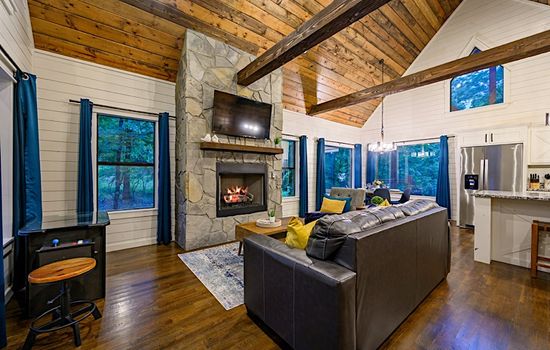 Open floor plan connects the living, dining and kitchen areas