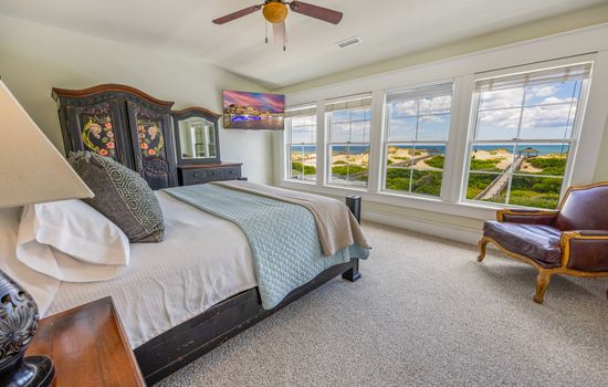Bedroom 18 — Alternative View Showcasing Relaxing Ambiance & Warm Tones | The Mark Twain 18-Bedroom Beach House, Outer Banks