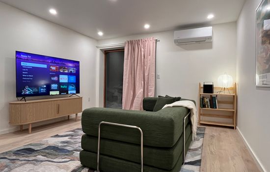 Lounge around and have a movie night on the 65" Roku TV.