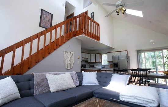 Cover Photo showcasing the high vaulted ceilings with plenty of natural light!