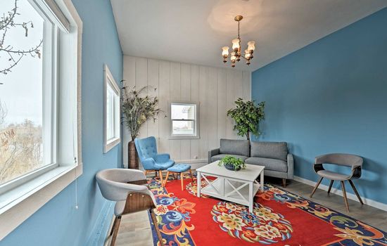 Cozy beautiful bright living room with modern bohemian decor.