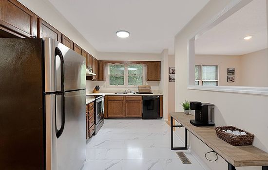 Kitchen with Stainless Steel Appliances and Coffee bar featuring a Keurig