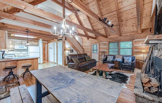 Large dining table open to the living room and Kitchen.