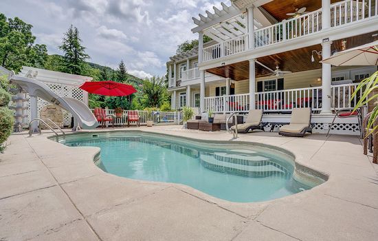 Custom pool with Waterslide  Overlooks the Jackson River