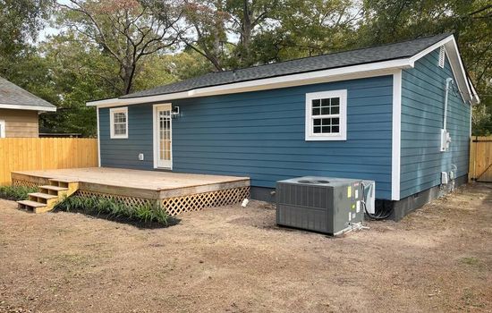 Fully Fenced in Backyard with Deck