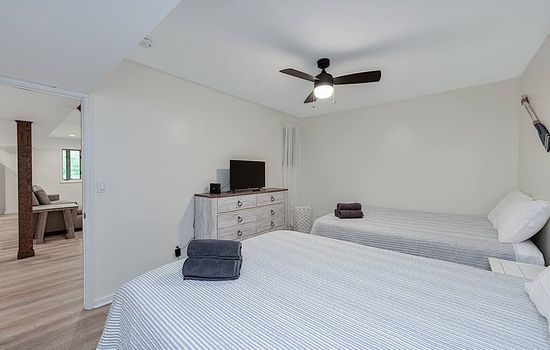 Bedroom 3 located downstairs
2 Queen Beds