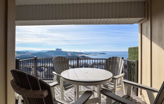 Seating on the deck with a beautiful of the lake