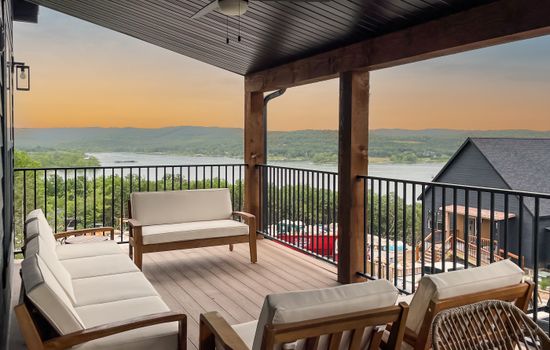Unwind on the main level deck overlooking Table Rock Lake with the cozy outdoor seating