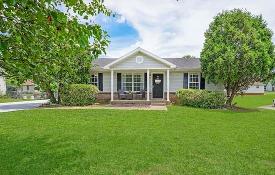 Spacious front yard with a porch.