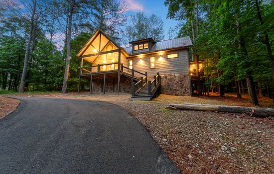 Cozy, rustic cabin secluded in the tall pines is warm & welcoming.