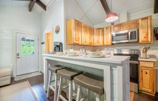 A fully equipped kitchen featuring everything you need to whip up a local farm-to-table feast.