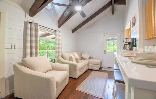Unwind in our cozy living area—the perfect spot for morning coffee or evening puzzles.