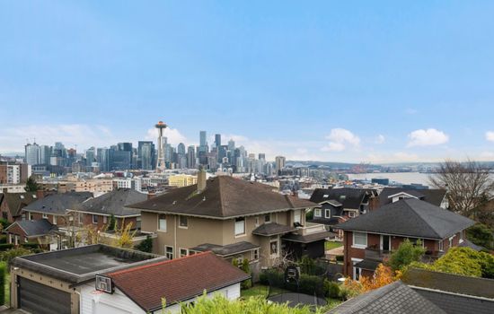 The stunning view of Seattle, featuring the iconic Space Needle, the city skyline, and the waterfront in the background