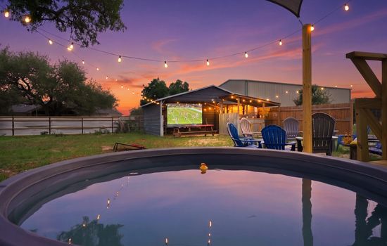 Private cowboy pool under the lights — soak, cool off, and unwind day or night