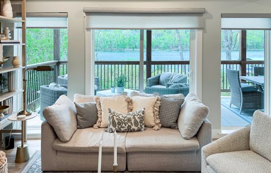 Great room looking out to the lake and the covered patio